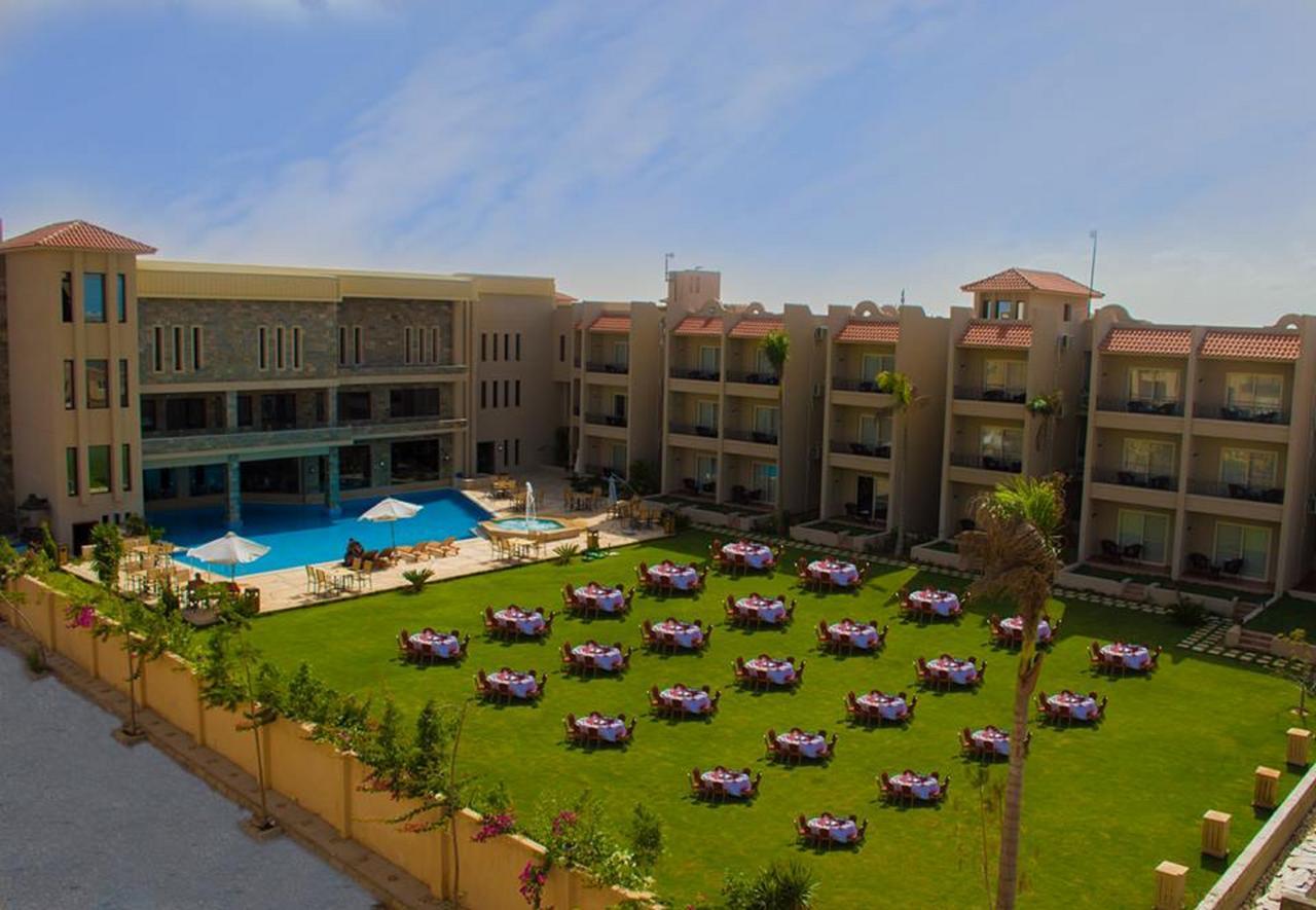 Panacea Suites Hotel Borg El Arab Exterior foto